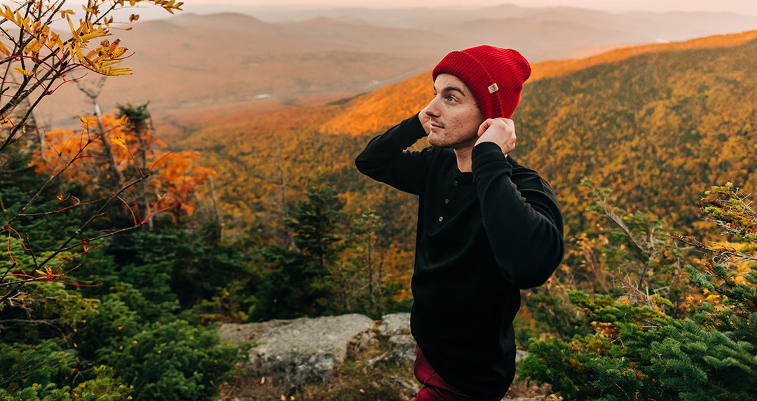 man hiking wearing everyday knit beanie in the fall